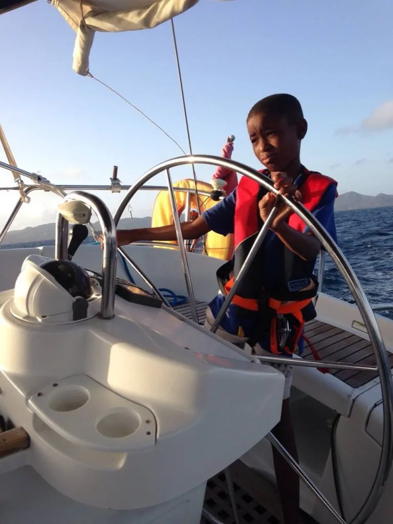 Young sailor learning the ropes